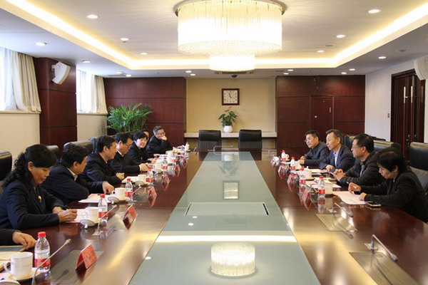 民盟中央常务副主席陈晓光会见中共河北省委常委、统战部部长高志立一行(图1)